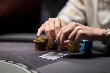 Clay poker chips and premium playing cards for home games